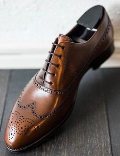 Brown Brogue Lace-up Shoes For Office, Brown Oxfords With Brogue Detailing And Pointed Toe, Brown Wingtip Monk Strap Shoes For Office, Brown Pointed Toe Oxfords With Brogue Detailing, Brown Monk Strap Shoes With Goodyear Welted Pointed Toe, Brown Monk Strap Shoes With Brogue Detailing For Office, Brown Brogue Monk Strap Shoes For Office, Brown Brogue Lace-up Dress Shoes, Brown Pointed Toe Dress Shoes With Rubber Sole