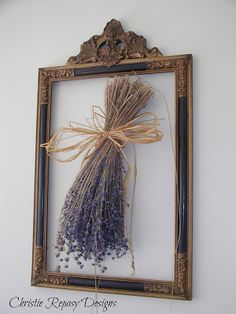 dried lavender flowers are tied to the frame