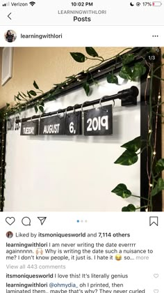 a white refrigerator freezer sitting next to a green plant