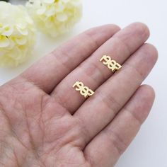 Title: Birth Year Earrings, 14k Gold, Birthdate Earrings, Birthday Earrings, Date Earrings, Custom Date Earrings, Year Earrings, Number Earrings- Have a look at our other Number/Date pieces: https://etsy.me/3ijT1ll- Each earring can have different number (Maximum 4 digits for each number).- If the butterfly backing has been pushed too far or if you are finding a hard time getting the butterfly backing out, please don't force it out. You may need to loosen it a bit. If you want any advice regardi Birth Flower Earrings For Anniversary, Gold Birth Flower Round Earrings, Gold Birth Flower Earrings, Adjustable Gold Birth Flower Earrings, Yellow Gold Flower-shaped Birth Flower Earrings, Beautiful Gold Necklaces, Birth Year, Map Necklace, Solid Gold Earrings