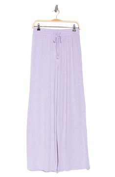 Keep comfy while you search for a new series to watch in these wide-leg pants cut from soft and stretchy fabric. Elastic/drawstring waist 73% rayon, 24% polyester, 3% spandex Machine wash, tumble dry Imported Casual Sleep Pants, Casual Sleepwear Trousers With Elastic Waistband, Casual Sleep Pants With Pockets, Solid Color Wide Leg Sleepwear For Spring, Casual Sleep Pants With Elastic Waistband, Solid Wide Leg Sleepwear For Spring, Casual Relaxed Fit Sleep Pants, Casual Solid Bottoms For Pajama Party, Casual Sleepwear With Relaxed Fit Trousers