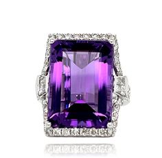 This stunning Statement ring has a AAA quality emerald cut African Amethyst with 4 prong setting in 14 karat white gold. There are 52 shimmering brilliant cut round diamonds and 4 baguette diamonds on the shank. This beautiful ring will be the talk of your special event. This ring will be shipped in a beautiful box, ready for the perfect gift! The ring is brand new with original tags attached.  Ring size: 6.5 US 14K gold weight: 4.80 grams  Amethyst: 18.49 ct, 18x13 mm emerald cut Diamonds: 52 b Luxury Purple Emerald Cut Jewelry, Luxury Emerald-cut Amethyst Ring For Anniversary, Luxury Emerald-cut Amethyst Ring As A Gift, Luxury Purple Emerald-cut Jewelry, Luxury Emerald-cut Amethyst Ring For Formal Events, Citrine Earrings Studs, Ruby Earrings Studs, Statement Rings Diamond, Amethyst Gem