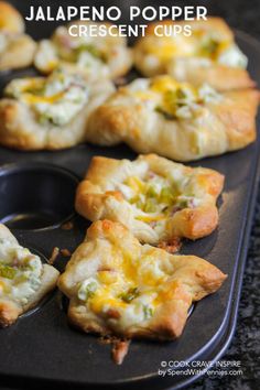 jalapeno popper crescent cups on a baking tray