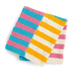 two crocheted dishcloths with different colors on each side, one in white and the other in pink