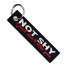 a keychain with the words hot on it