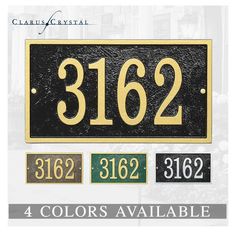 a black and gold house number sign with numbers on the front, and four colors available