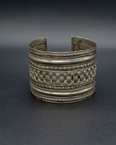 A beautiful relic from the past, this vintage silver cuff is crafted with passion by skilled artisans from the Turkman tribe, each design element tells a unique story waiting to be unraveled. This item will ship directly from Bali via DHL delivery. Please allow up to 15 business days to arrive.