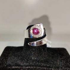 Title : Natural Star Ruby Ring, Handmade Ring, July Birthstone Ring, 925Sterling Silver Ring, Statement Ring, Round Star Ruby, Anniversary Gift. Band : Aarohi Jewellers Material : 925 Sterling Silver Gemstone : Star Ruby Star Ruby Stone Wight : 2.10 Ct, Stone Size :6/6mm Style: Minimalist All of our jewelry is handmade with great care by our team. We carefully inspect all the jewelry after production and before shipping, and make sure you are well taken care of. Customer satisfaction is extremel Silver Star-shaped Gemstone Ring, Silver Star-shaped Ring With Gemstone, Handmade Star-shaped Rings For Anniversary, Star-shaped Sterling Silver Sapphire Ring, Sterling Silver Star-shaped Sapphire Ring, Silver Ruby Open Ring Hallmarked, Silver Sterling Ruby Ring With Accent Stones, Star Shaped Sapphire Ring For Anniversary In Sterling Silver, Silver Ruby Ring With Hallmark, Open Ring Style