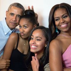 the obama family is posing for a photo