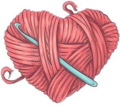 a ball of yarn in the shape of a heart with two hooks on each end