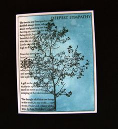 an open book with the words deepest sympathy written on it and a tree in the middle