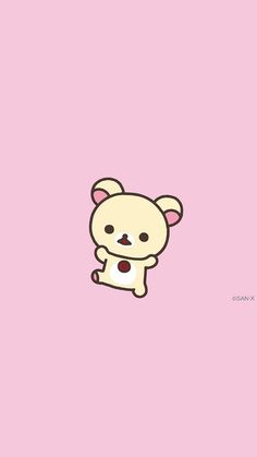 a cute little white bear sitting on top of a pink wall