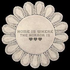 a doily with the words home is where the heart is