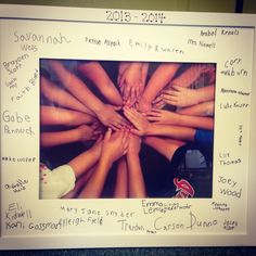 a group of people holding their hands together in a white frame with writing on it