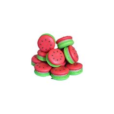 a pile of watermelon cookies sitting on top of each other