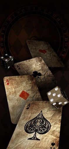 four playing cards with dice on them in the dark