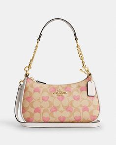 COACH® | Teri Shoulder Bag In Signature Canvas With Heart Print Coach Bags Heart, Cute Bags Outfit, Shoulder Coach Bag, Cute Shoulder Bags Purses, Pink Coach Shoulder Bag, Teri Bag Coach, Coach Heart Purse, Heart Coach Bag, Cute Pink Purse