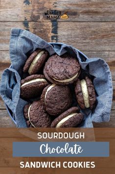 chocolate sandwich cookies in a blue cloth bag on a wooden table with text that reads, sourdough chocolate sandwich cookies