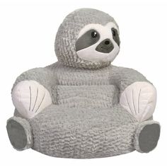 a stuffed slotty sitting on top of a gray chair with white legs and feet