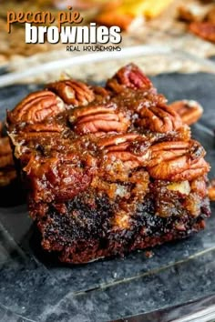 pecan pie brownies are stacked on top of each other and ready to be eaten