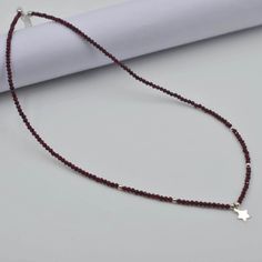 Elegant Ruby Beaded Charm Necklace - Delicate Silver Chain Necklace, 925 Silver Ruby Beaded Gemstone Women necklace Jewelry Item Detail > Material : 925 Sterling Silver, Ruby Product Weight : 3.95 Gram Stone Size :      2 mm Necklace Length : 18 inch Product  : Beaded Necklace Theme : valentine's day, party Wear, Special Occasion Condition: BRAND NEW Features and further details Top Quality Ruby Gemstone Rondell Faceted Beads 925 Sterling Silver Necklace, a true masterpiece in charm jewelry. Cra Ruby Beads, Women Necklace, 925 Sterling Silver Chain, Ruby Gemstone, Silver Chain Necklace, Faceted Bead, Necklace Jewelry, Charm Jewelry, Sterling Silver Chains