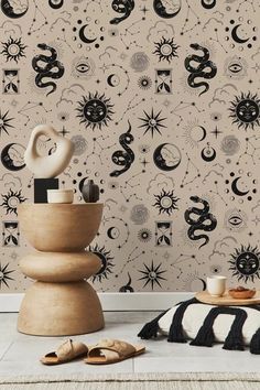 the wallpaper is decorated with black and white designs