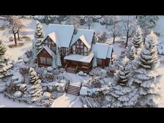 an aerial view of a house in the snow