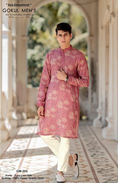 *PRODUCT DETAILS:- Offering a vibrant and eye-catching look, the Pastel Maroon kurta set is adorned with a mesmerizing kaleidoscopic print. The design is further accentuated with an embellished placket and bandhgala collar, adding a touch of glamour to the traditional silhouette. Suitable for festive and cultural events, this printed kurta set can be styled with sleek gold jewellery and tan sandals to enhance its intricate patterns and rich colors. *FEATURES:- Color: Pastel Maroon Fabric: 100% p Pink Long Sleeve Sets For Transitional Season, Pink Sets For Puja During Transitional Season, Pink Long Sleeve Traditional Wear With Bandhani Print, Pink Long Sleeve Bandhani Traditional Wear, Pink Bandhani Print Traditional Long Sleeve Wear, Pink Long Sleeve Sets With Bandhani Print, Pink Long Sleeve Kurta With Bandhani Print, Luxury Pink Jamawar Kurta, Mauve Kurta Men