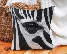 a zebra's eye is seen in the center of this pillow