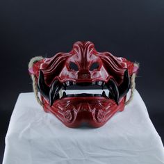 Oni samurai Masks Ghost of Tsushima Mask We Can Keep for Art and Collection Turkish made handmade masks. We are happy to produce our masks that we have carefully prepared for you, our valued customers, as we go from daily life to fun moments. The masks we produce are comfortable to use. We painted our coloring processes in colors that we think are suitable for parties, proms, festivals and entertainment areas. If you wish, you can choose the colorless (raw) form and paint it according to your ow Traditional Cosplay Masks, Traditional Cosplay Masks And Prosthetics, Handmade Red Masks And Prosthetics For Masquerade, Handmade Red Masquerade Mask, Red Oni Mask, Ghost Of Tsushima Mask, Samurai Masks, Oni Maske, Mascara Oni