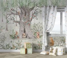 a child's room decorated with wallpaper, curtains and teddy bears on the tree