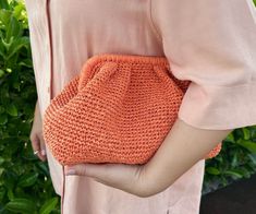 "Introducing our Orange Raffia Pouch Clutch Bag, the ultimate wicker beach clutch and summer bag. Handcrafted with care and attention to detail, this vibrant accessory is perfect for adding a pop of color to your outfit. Whether you're strolling along the beach or enjoying a sunny day in the city, this versatile bag will keep your essentials secure and in style. Made from high-quality raffia, it's lightweight and durable, making it ideal for everyday use. Elevate your summer wardrobe with this trendy and functional clutch bag. Shop now and embrace the sunny vibes with our Orange Raffia Pouch Clutch Bag. ✔️ Suitable for use as hand bag, make-up bag or party bag * Timless and guality handmade crochet product ⚠️ If you want to buy the product in the images, you need to select the color \"BEIG Casual Summer Clutch With Removable Pouch, Summer Handheld Pouch For Daily Use, Chic Summer Travel Pouch, Handwoven Orange Crochet Bag For Summer, Orange Crochet Travel Bag For Summer, Summer Handwoven Orange Crochet Bag, Summer Beach Handheld Pouch, Handheld Beach Pouch For Summer, Handheld Summer Beach Pouch