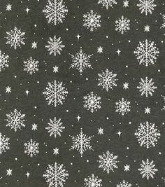 black and white snowflakes on a dark background