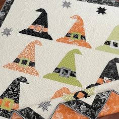 an image of a quilt with witches on it