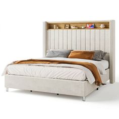 a bed with a headboard and foot board on it's sides, sitting in front of a white wall