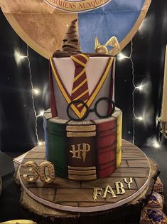 a harry potter themed birthday cake on display