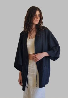 Loose Haori Kimono The fabric of this kimono jacket is 100% quality linen, it is very pleasant to wear over a basic outfit. This jacket adapts to all situations, it gives you both a casual look for an outing with friends (jeans, sneakers, etc.) and a classy and neat style for a night out. Side pocket Tie on the front Black color Unisex Unique size Belt sold separately for €30 Website https://www.a=liberti.com Black Linen Relaxed Fit Outerwear, Casual Linen Kimono With Kimono Sleeves, Casual Linen Beach Outerwear, Linen Kimono With Relaxed Fit, Black Relaxed Fit Kimono For Spring, Black Relaxed Fit Kimono With Kimono Sleeves, Black Kimono With Relaxed Fit, Kimono Jeans Outfit, Haori Outfit