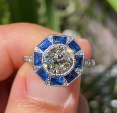 Victorian 4 CT Round Cut Moissanite Diamond Side Blue Sapphire Diamond Vintage Ring 10K 14K 18K Solid White Gold Engagement Ring Bridal Ring R I N G M E T A L ✥ Metal : 10K 14K 18K Solid White Yellow and Rose Gold, 925 Sterling Silver ✥ Metal Clarity : 100% Pure ✥ Stamp/Hallmark : Yes. Will be Indicated Inside The Ring M A I N S T O N E S ✥ Type : Moissanite  Diamond ✥ Center Diamond Shape : Round Brilliant Cut Diamond ✥ Center Diamond Weight : 4 CT ✥ Center Diamond Color : White ✥ Side Diamond Shape : Sapphire Princess Cut Diamond ✥ Side Diamond Weight : 1.62 CT ✥ Clarity : VVS1 ✥ Certificate : (No Extra Charges For Certificate) ✥ Diamond Cut : Excellence R I N G S I Z E S ✥ All Ring Size are Available ✥ Free Sizing ✥ If You Have any Questions With Regards to Sizing Please Contact as ✥ Pl Art Deco Sapphire Ring With Gia Certified Diamond, Art Deco Gia Certified Sapphire Ring With Diamond, Art Deco Gia Certified Sapphire And Diamond Ring, Gia Certified Art Deco Rings, Gia Certified Yellow Gold Sapphire Ring With Diamonds, White Gold Sapphire Cluster Ring Gia Certified, Art Deco Gia Certified Round Cut Sapphire Ring, Gia Certified Round Art Deco Jewelry, Gia Certified Art Deco Round Jewelry