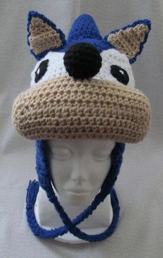 a crocheted hat with an animal's face on it