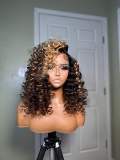 This is a GLUELESS PREMADE/FACTORY MADE UNIT. There is ONE unit ready to ship. Once it is sold, you may customize this unit style to your liking through preorder * Wig Specs Style: flip over/flexi rod curls Density: 200% Length: 22 Hair type: Virgin (loose deep wave) Color:natural dark brown & light brown ombre wit golden blonde and light blonde highlights Lace: transparent 5x5 lace closure Curly Brown Wig With Highlights, Short Deep Wave Wig Styles, Blonde Curly Wig Black Women, Curly Wig With Highlights, Maternity Hairstyles, Brown And Blonde Wig, Honey Blonde Curly Wig, Deep Wave Wig Hairstyles, Curly Wig Styles