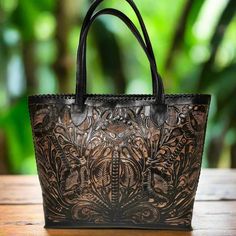 Women's Bag, Hand Tooled Leather, Tote, Handmade, Chiseled Bag, Skull Bag, Black Tote Bag, Gift for Her, Gift for Mom - Etsy Black Hand Tooled Tote Shoulder Bag, Black Hand Tooled Tote Bag, Black Hand Tooled Shoulder Bag For Everyday, Black Hand Tooled Rectangular Shoulder Bag, Hand Tooled Tote Bag As Gift, Travel Hand Tooled Shoulder Bag, Black Hand Tooled Bags For Everyday Use, Hand Tooled Tote Bag For Daily Use, Hand Tooled Top Handle Bag