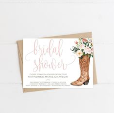 the bridal shower card is shown with boots and flowers in it, on top of a