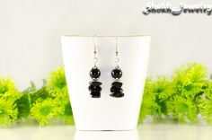 These gorgeous earrings are made with genuine black obsidian 8mm round beads, chip beads, bead caps and ear wires. They are lightweight and very comfortable to wear. These unique and stylish earrings are sure to get you compliments and they would be a wonderful addition to your jewelry collection.  The earrings have silver tone fish hook ear wires, and clear plastic backs to keep them in place. The ear hooks are made of Nickel Free metal. You can upgrade your ear wires to hypoallergenic .925 sil Black Natural Stones Drop Earrings, Black Earrings With Natural Stones For Gift, Black Earrings With Natural Stones, Black Natural Stones Earrings For Gift, Black Natural Stone Dangle Earrings, Black Crystal Earrings With Ear Wire For Gift, Boho Chic Aesthetic, Raw Crystal Earrings, Chip Earrings