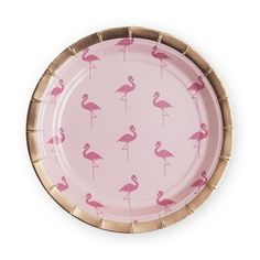 a pink flamingo paper plate with gold rims on a white background, it's all lined up and ready to be eaten