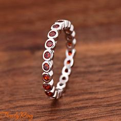 Solid 925 Sterling Silver 3mm Dainty January Birthstone Red Garnet Color CZ Bezel Set Full Eternity Band Bubble Stackable Ring Size 5-10 ▷Gift Box Included ▷3mm Height ▷Size 5-10 Available ▷925 Sterling Silver (not plated or filled) ▷925 Stamp Authenticity ▷High-Quality Cubic Zirconia Used https://www.etsy.com/shop/TrendyRing Red Garnet Stackable Rings For Anniversary, Red Garnet Stackable Anniversary Rings, Red Garnet Stackable Rings, Red Cubic Zirconia Round Band Jewelry, Adjustable Red Sterling Silver Stackable Rings, Red Round Eternity Band As Gift, Red Eternity Band Gift, Red Garnet Stackable Jewelry, Garnet Color