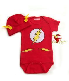 a red baby bodysuit with the flash symbol on it's chest and yellow lightning bolt