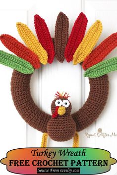 a crocheted turkey wreath is hanging on the door