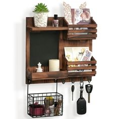 a shelf that has some items on it and a chalkboard attached to the wall