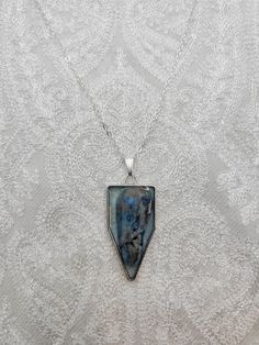 Blue Apatite Stone Pendant – Strange Bird Creations Metal Pendant Necklace For Memorial, Silver Square Pendant Jewelry, Metal Pendant Necklace For Memorials, Silver Square Pendant Jewelry With Soldered Details, Unique Silver Teardrop Pendant Necklace, Silver Jewelry With Soldered Square Pendant, Unique Silver Necklace With Rectangular Pendant, Unique Sterling Silver Necklace For Memorial, Handmade Metal Jewelry With Rectangular Pendant