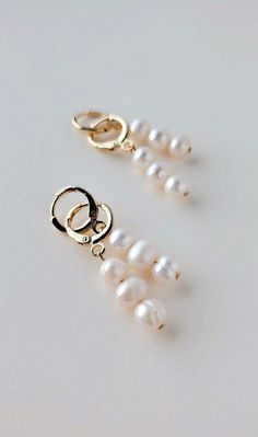 Pearl White Dangle Hoop Earrings With Pearl Charm, Pearl Drop Dangle Hoop Earrings, White Pearl Charm Dangle Huggie Earrings, Pearl White Dangle Hoop Earrings With Pearl Drop, White Hypoallergenic Dangle Huggie Earrings, Hypoallergenic Pearl White Dangle Earrings, Hypoallergenic Pearl White Dangle Pearl Earrings, Delicate White Huggie Pearl Earrings, White Single Pearl Huggie Earring